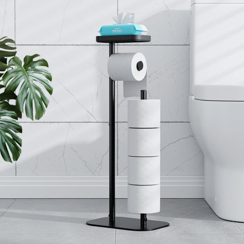 Kitsure front view of free-standing black toilet paper holder showing single roll and stored backups, neat storage benefit