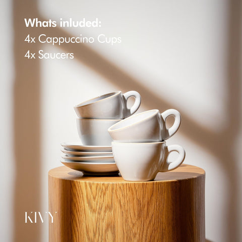 KIVY cup with latte art in hand demonstrating pour control and preserved crema