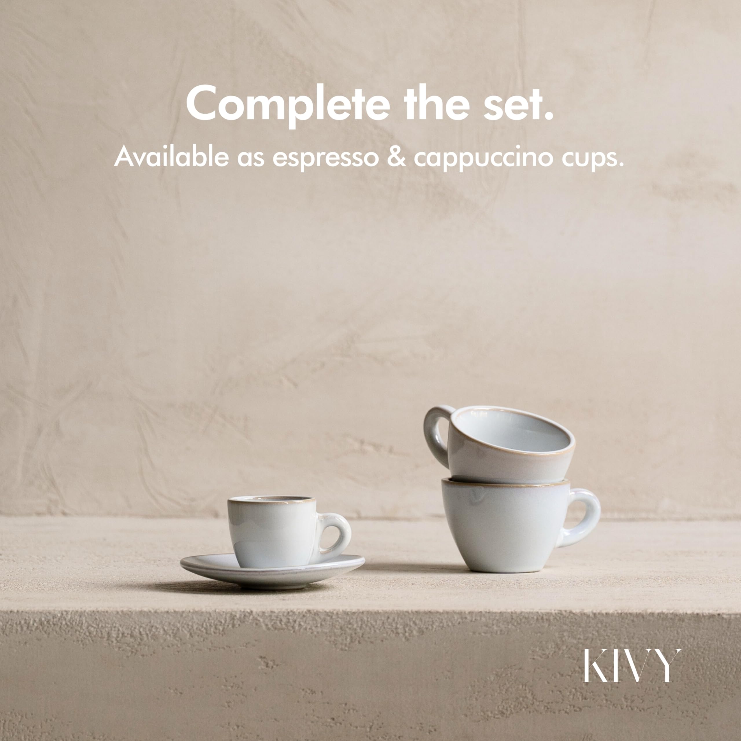 KIVY stacked cups next to hand showing real-world scale and space-saving storage
