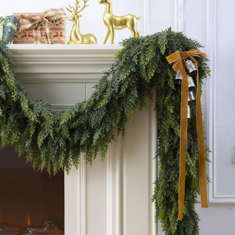 KIWDY garland on covered porch adding durable greenery and welcoming entrance charm