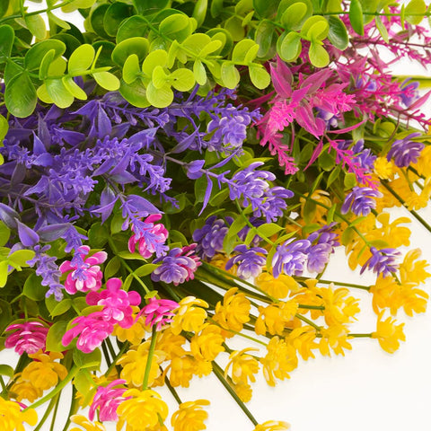 KLEMOO artificial plants in a porch planter adding lasting curb appeal