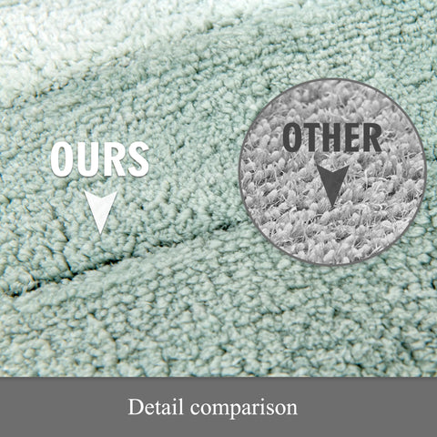 Kmson green ombre mats styled in a modern bathroom for coordinated decor