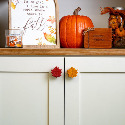 Knobēz installed on kitchen cabinet adding warm autumn color and charm