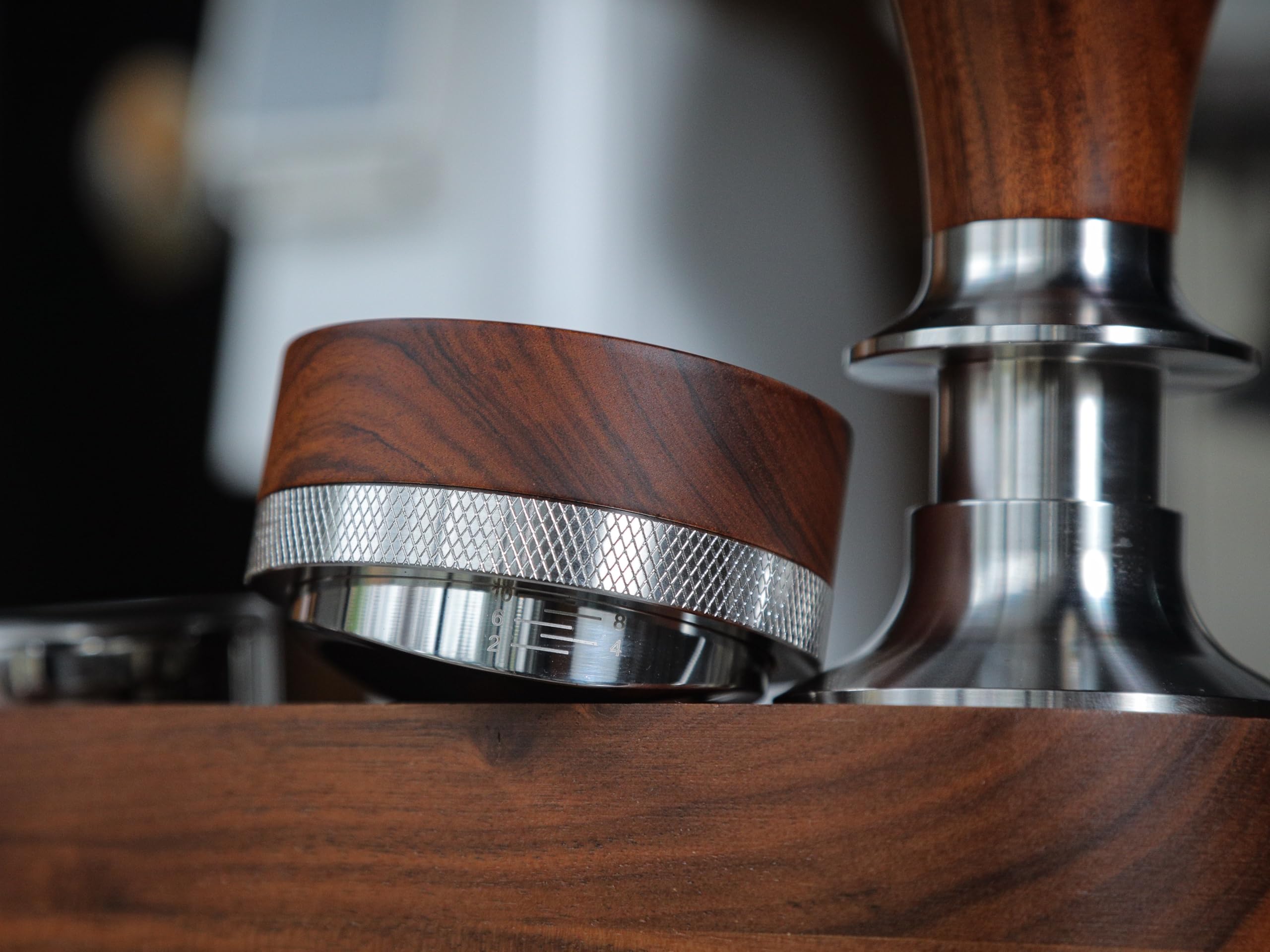 KNODOS stainless-steel base close-up highlighting precision machined leveling surface