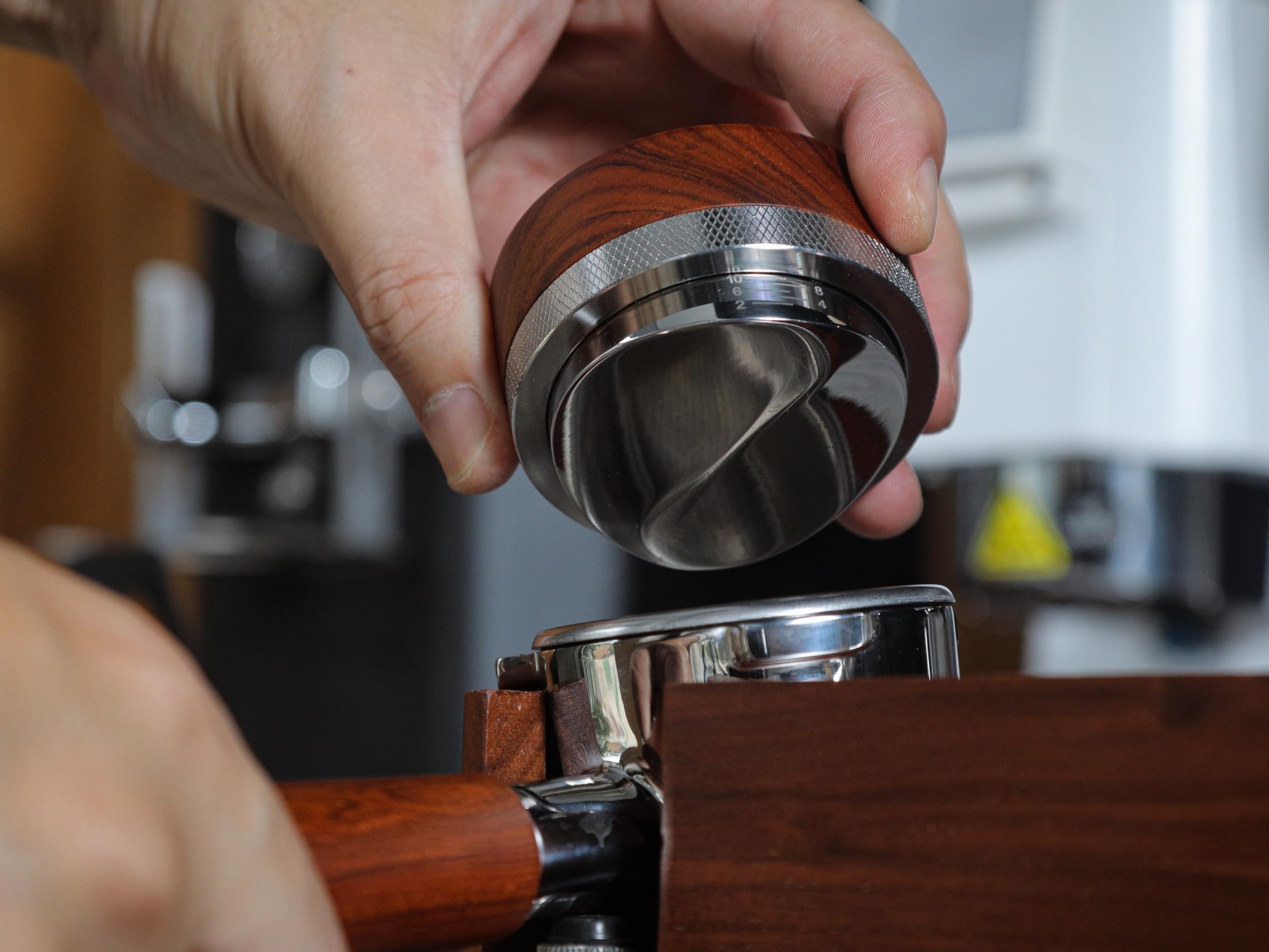 KNODOS in use leveling a coffee bed to promote more uniform extraction