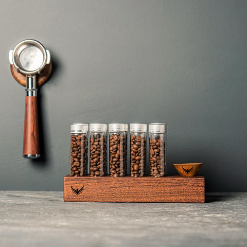 KNODOS hand grabbing a preloaded tube to speed morning grind and brew routine