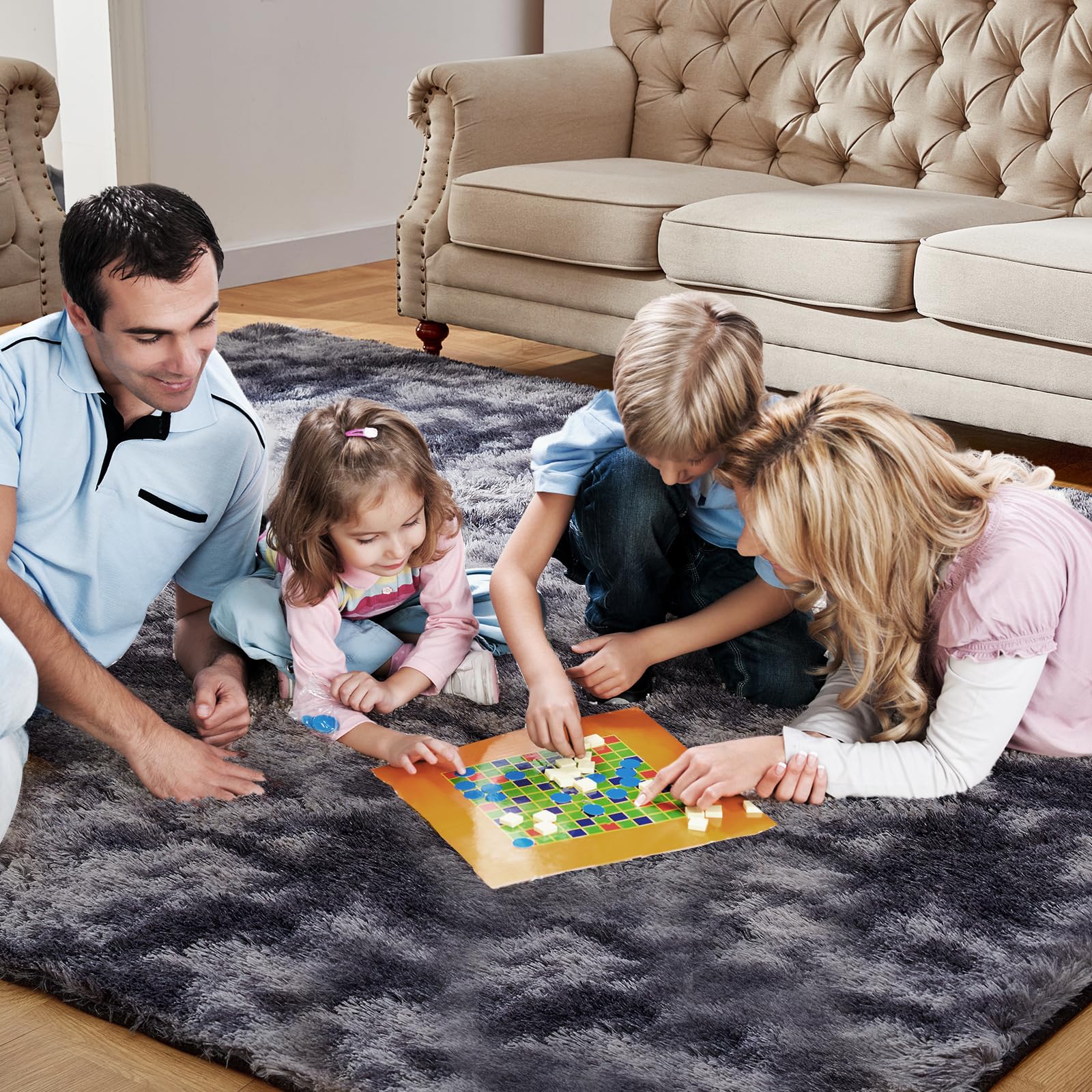 KNZE rug next to chair showing 5x7 scale and space-defining benefit