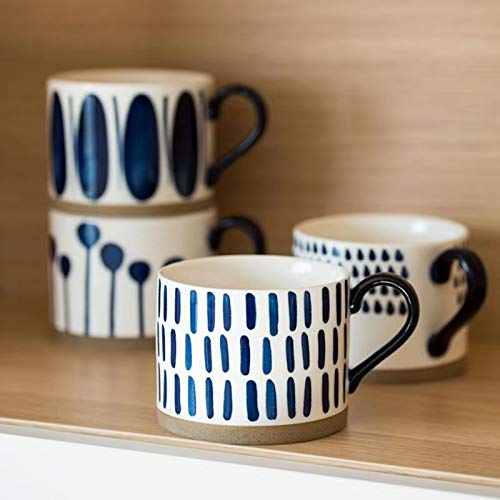 Koja mug held in hand to show 16 oz capacity and comfortable grip