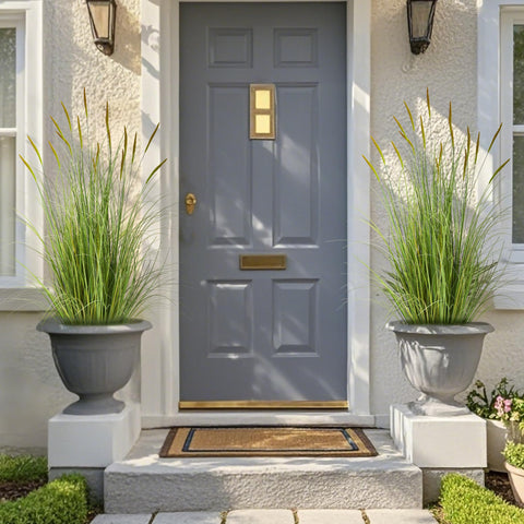 KOL pair of faux cattails in a tall vase adding instant greenery to living room