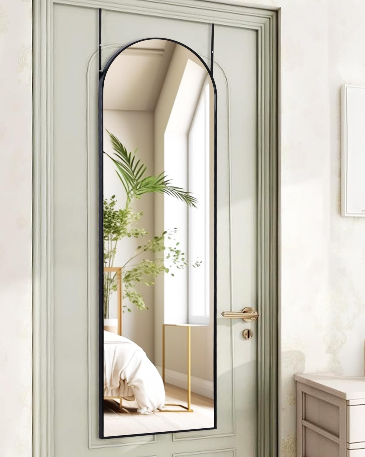 KOMCOTE front view arched mirror showing full-body reflection and space benefit