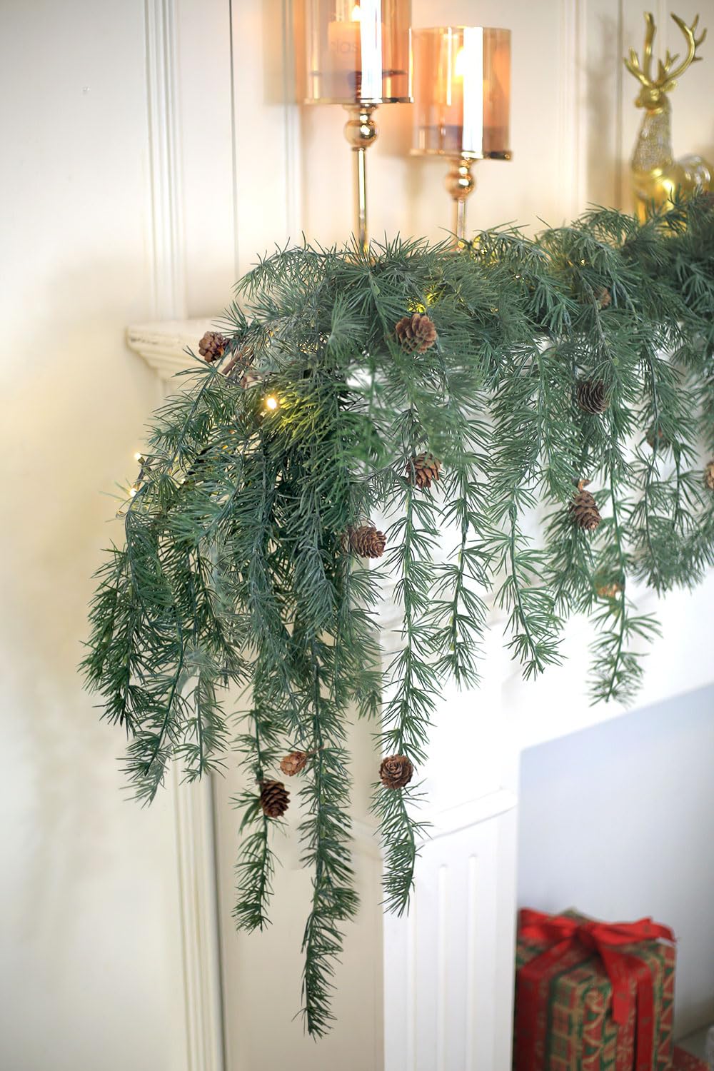 Konosnd garland on porch under cover illustrating weather-ready decor