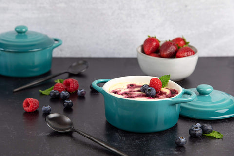 Kook cocotte plated with fruit crumble showcasing presentation and serving benefit
