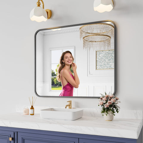 Koonmi front view of black framed mirror showing sleek silhouette and clarity