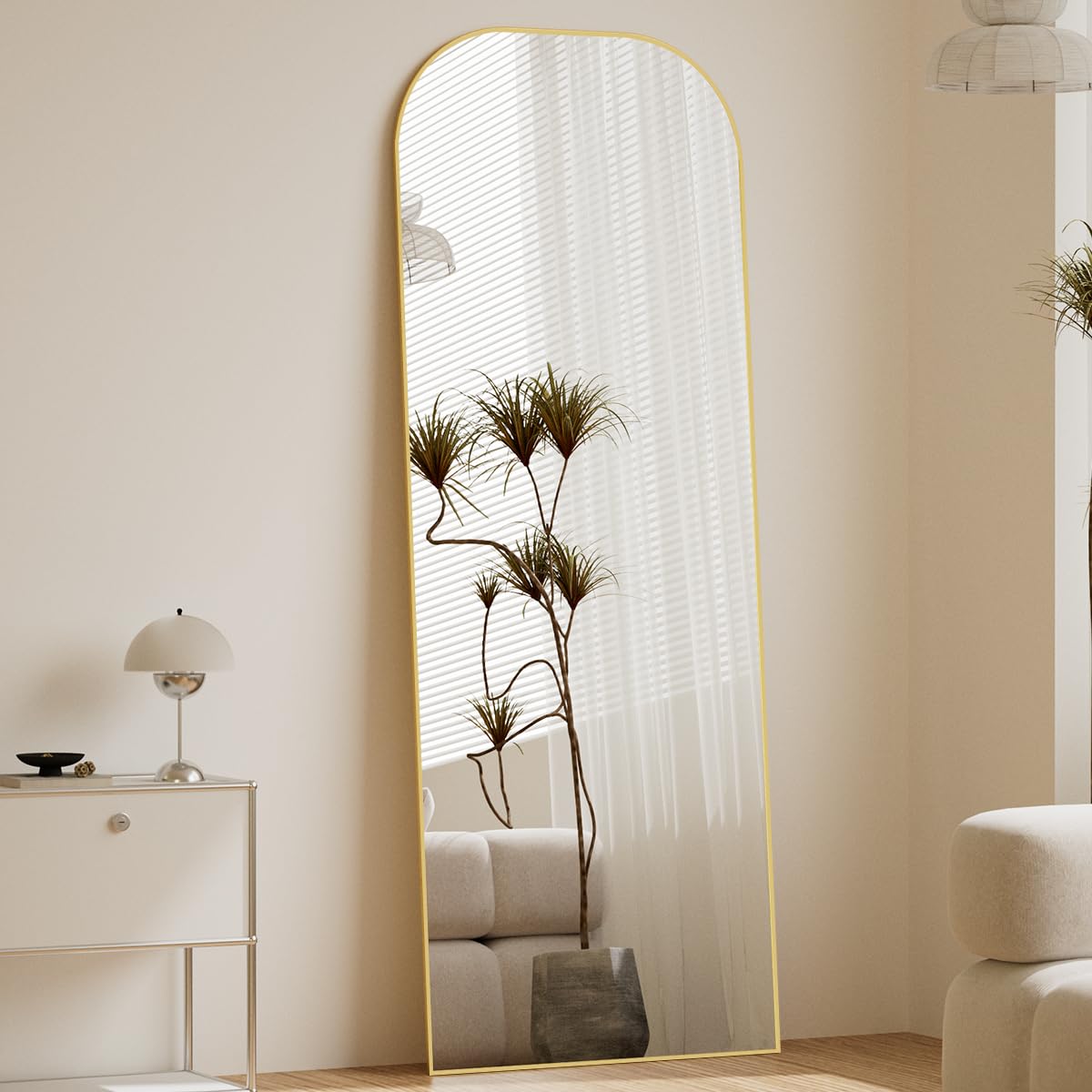 Koonmi mirror scale comparison with door illustrating 56x21 size for space planning benefit