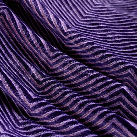 KORBLISS blanket on sofa during family movie night offers comfort for gatherings