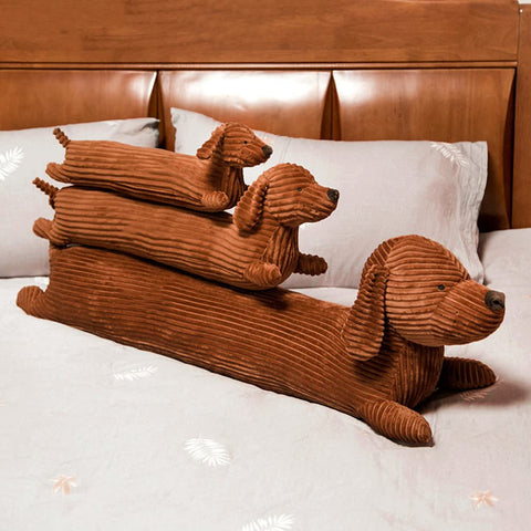 KOWAKA child hugging dachshund pillow demonstrating cozy companionship