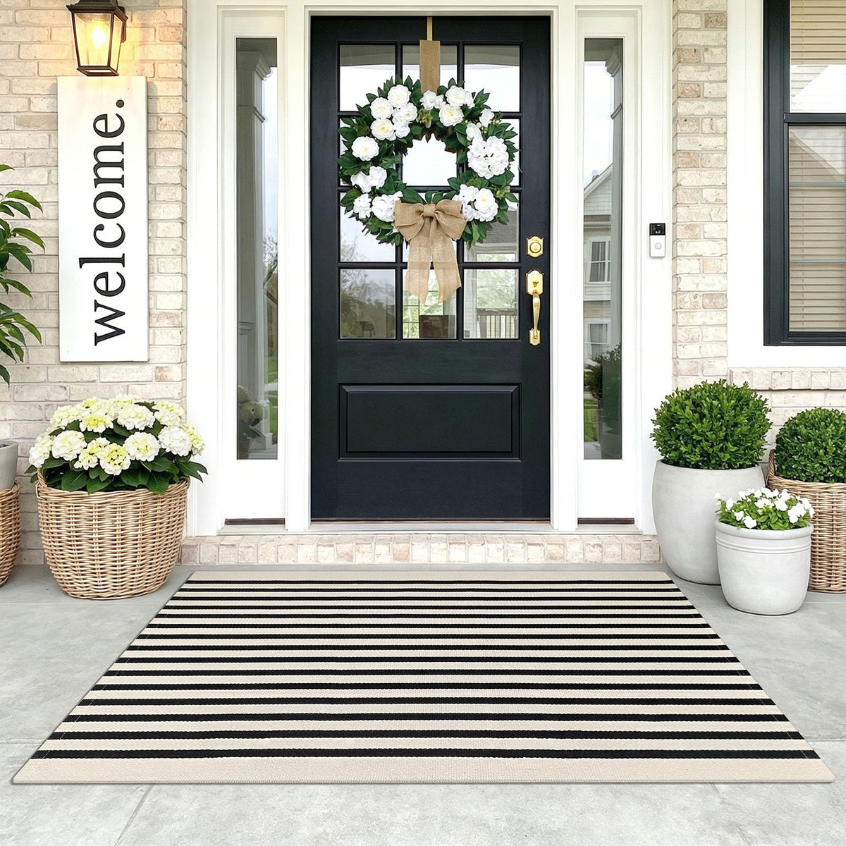 KOZYFLY front view of black and beige striped rug showing timeless entryway style