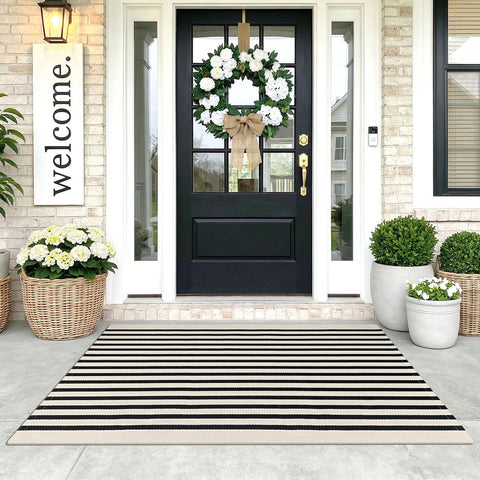 KOZYFLY front view of black and beige striped rug showing timeless entryway style
