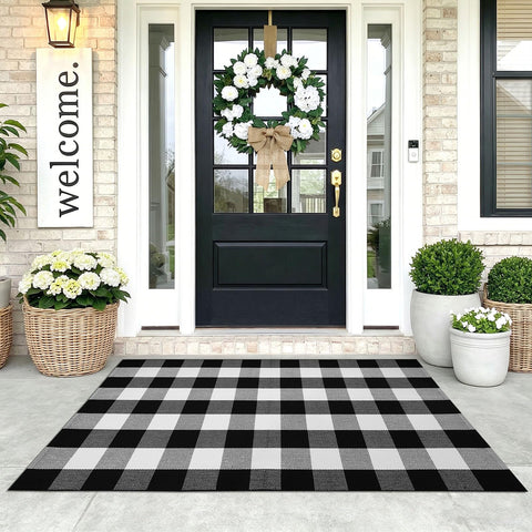 KOZYFLY front view of black and white checkered rug, adds timeless curb appeal