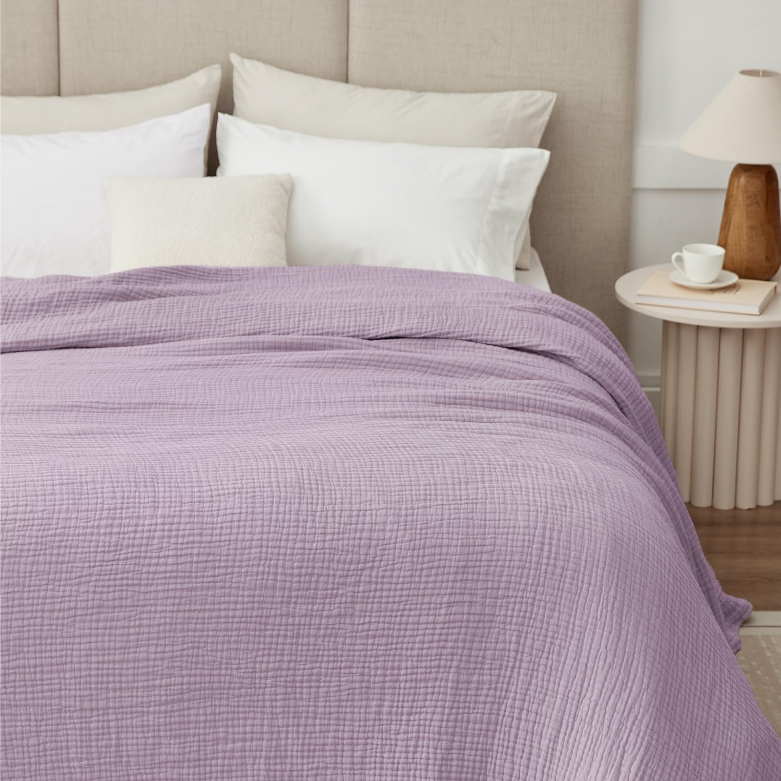 Kozyhvn blanket draped on bed adding cozy style and lightweight warmth