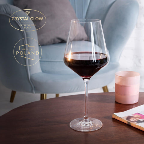 Krosno glass mid-pour with red wine illustrating aeration and rich color reveal