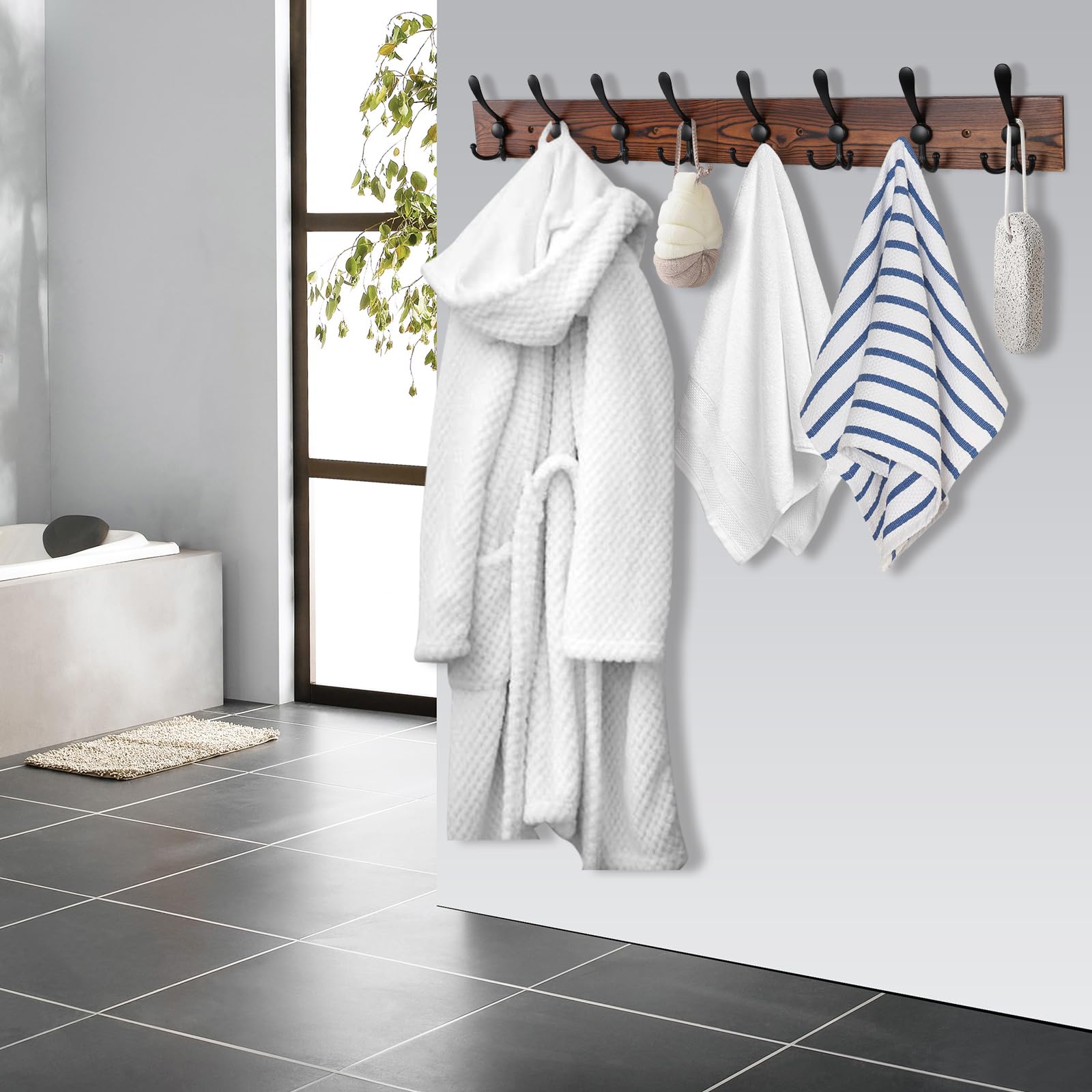 Kuhome two hinged sections split on a wall to show flexible height placement for users