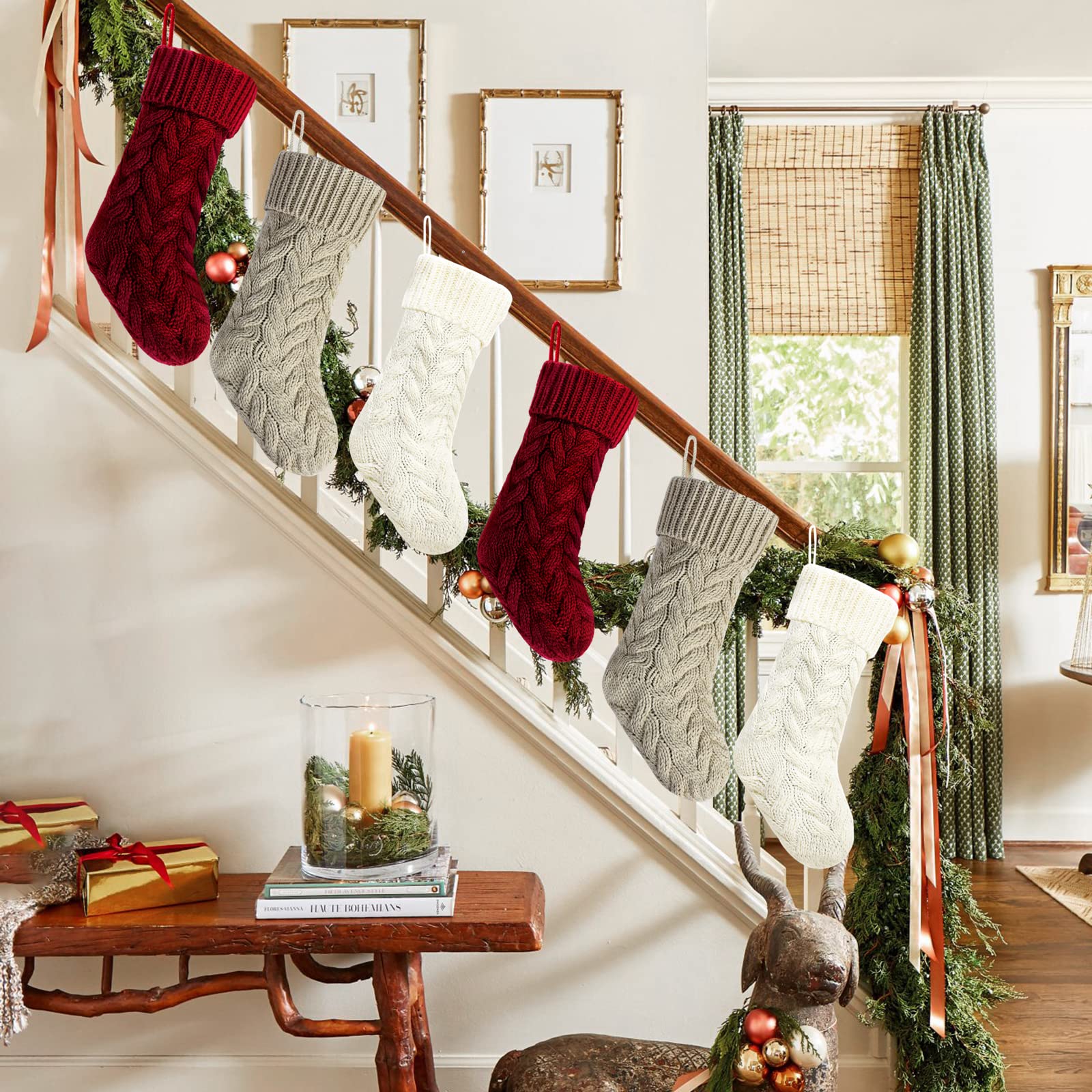 Kunyida stockings hanging on mantel adding cozy holiday charm