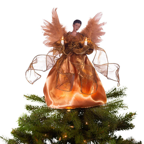 Kurt Adler angel placed on tree lit with ten lights showing warm glow