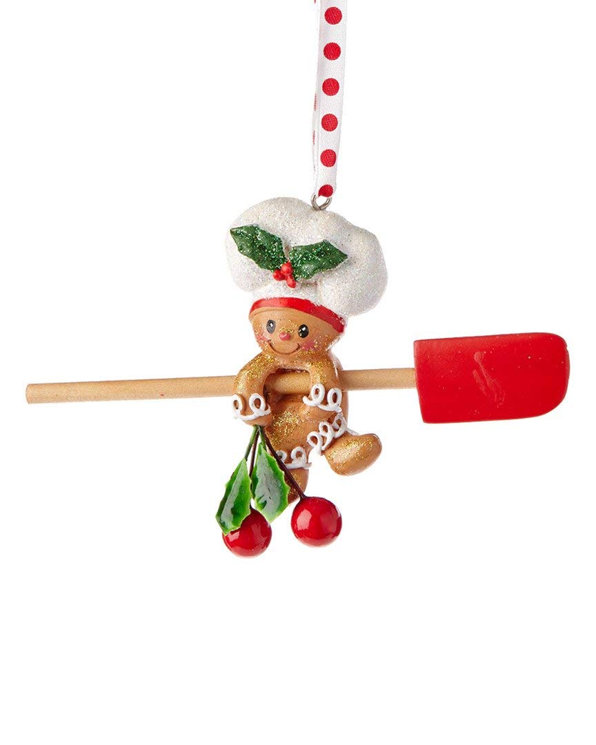 Kurt Adler ornaments hanging on a Christmas tree showing bakery theme and festive accent