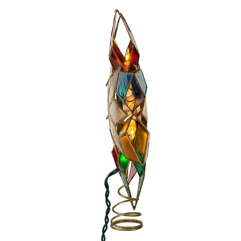 Kurt S. Adler star lit on a Christmas tree displaying balanced multi-color illumination and festive ambiance