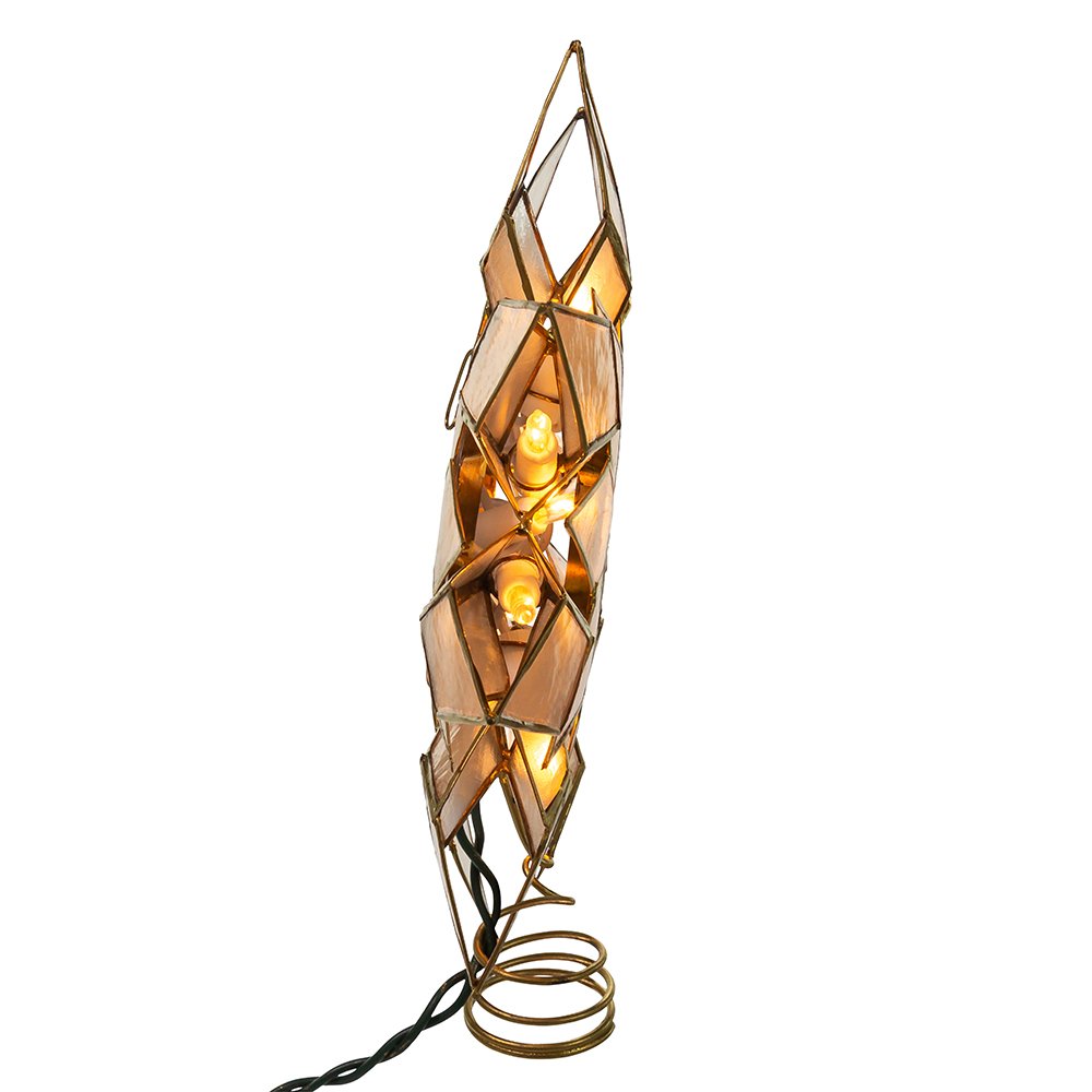 Kurt S. Adler star being held to show 9.25 inch scale for proper tree sizing