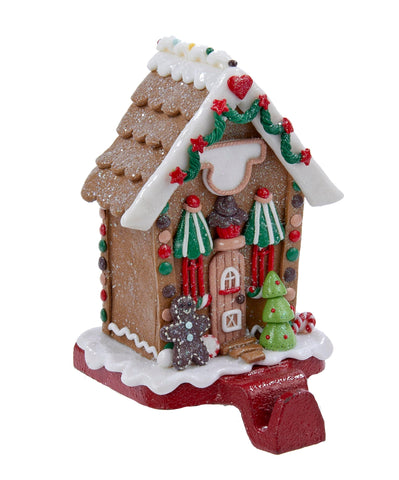 Kurt S. Adler gingerbread house front view showing festive detail and balanced base