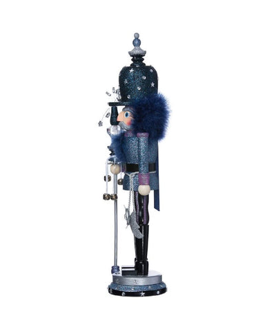 Kurt S. Adler nutcracker beside decor for scale and placement guidance