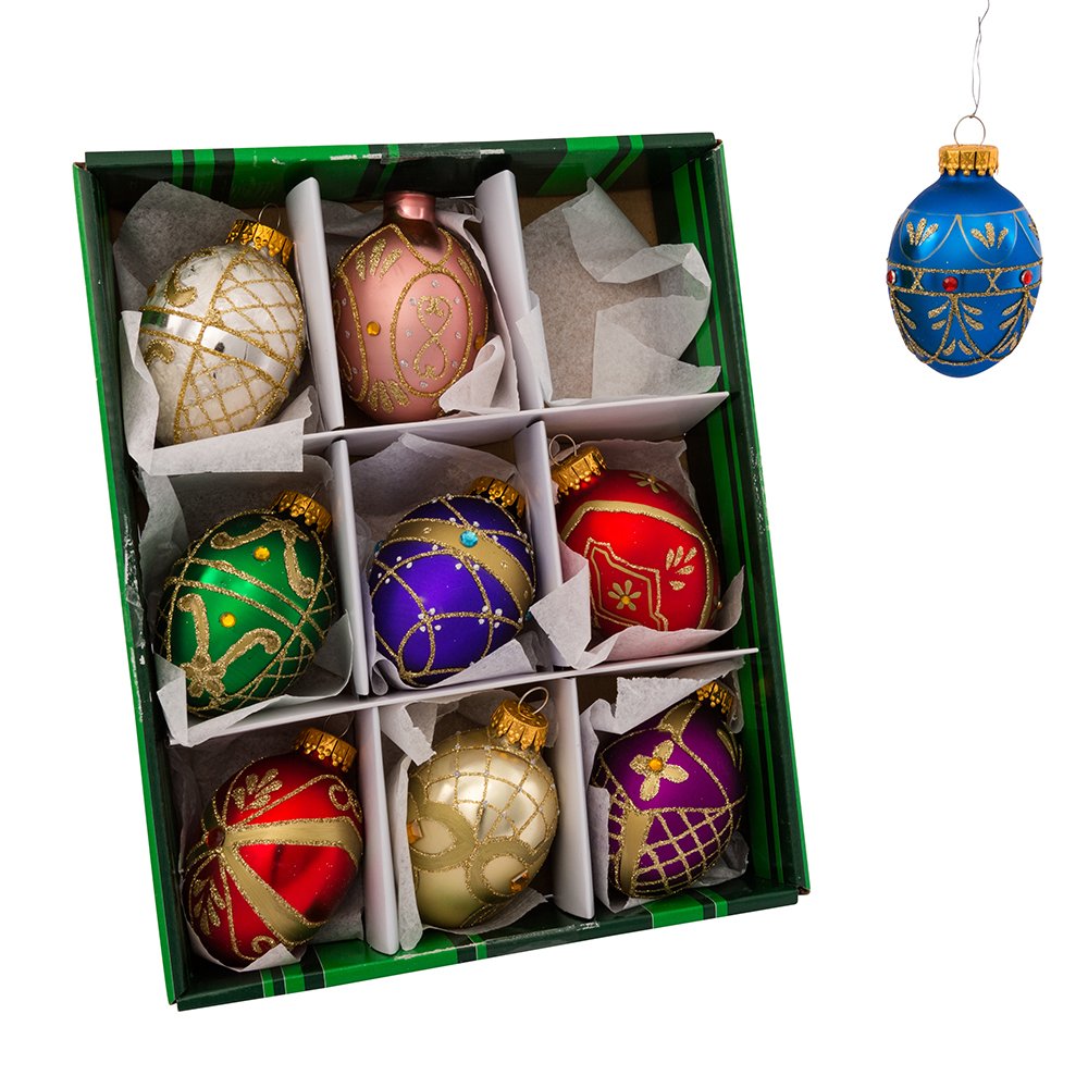 Kurt S. Adler ornaments hung on a lit Christmas tree enhancing seasonal shine