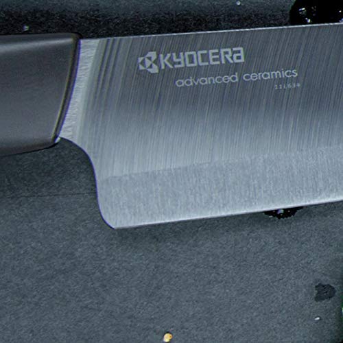 KYOCERA packaging and contents laid out to show included sizes and care notes