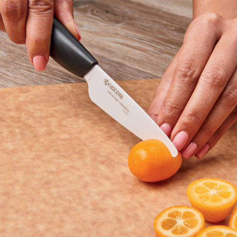 KYOCERA in use peeling an apple for precise, effortless cutting