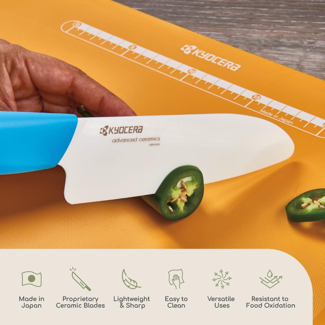 KYOCERA knife held in hand for scale showing lightweight handling advantage