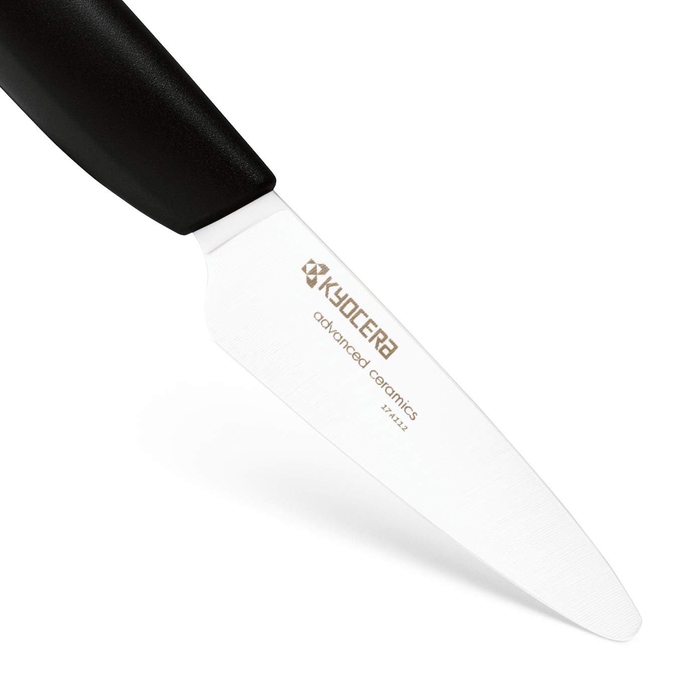 KYOCERA knives held in hand to show lightweight scale and balance