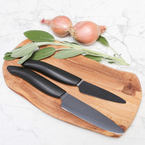 KYOCERA Santoku blade close-up showing ceramic edge for cleaner, precise cuts