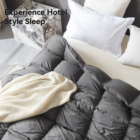 L LOVSOUL comforter on king bed with scale comparison highlighting full coverage benefit