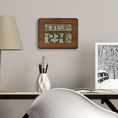 La Crosse Technology side profile showing wall-hang slot and tabletop stability for placement