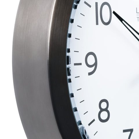 La Crosse Technology clock on warehouse wall aiding synchronized workforce timing
