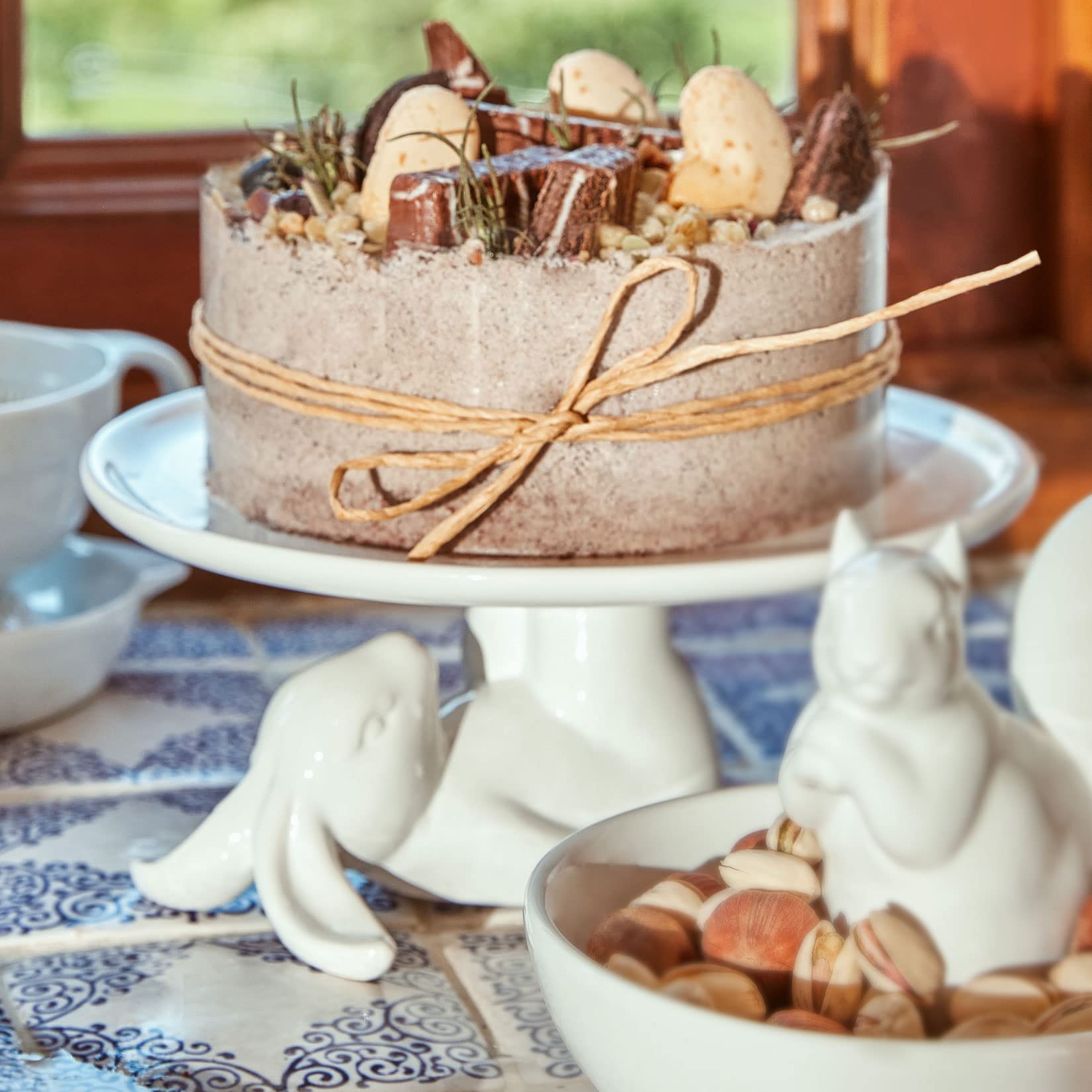 LA JOLIE MUSE cake stand in a spring table setting, elevates party presentation