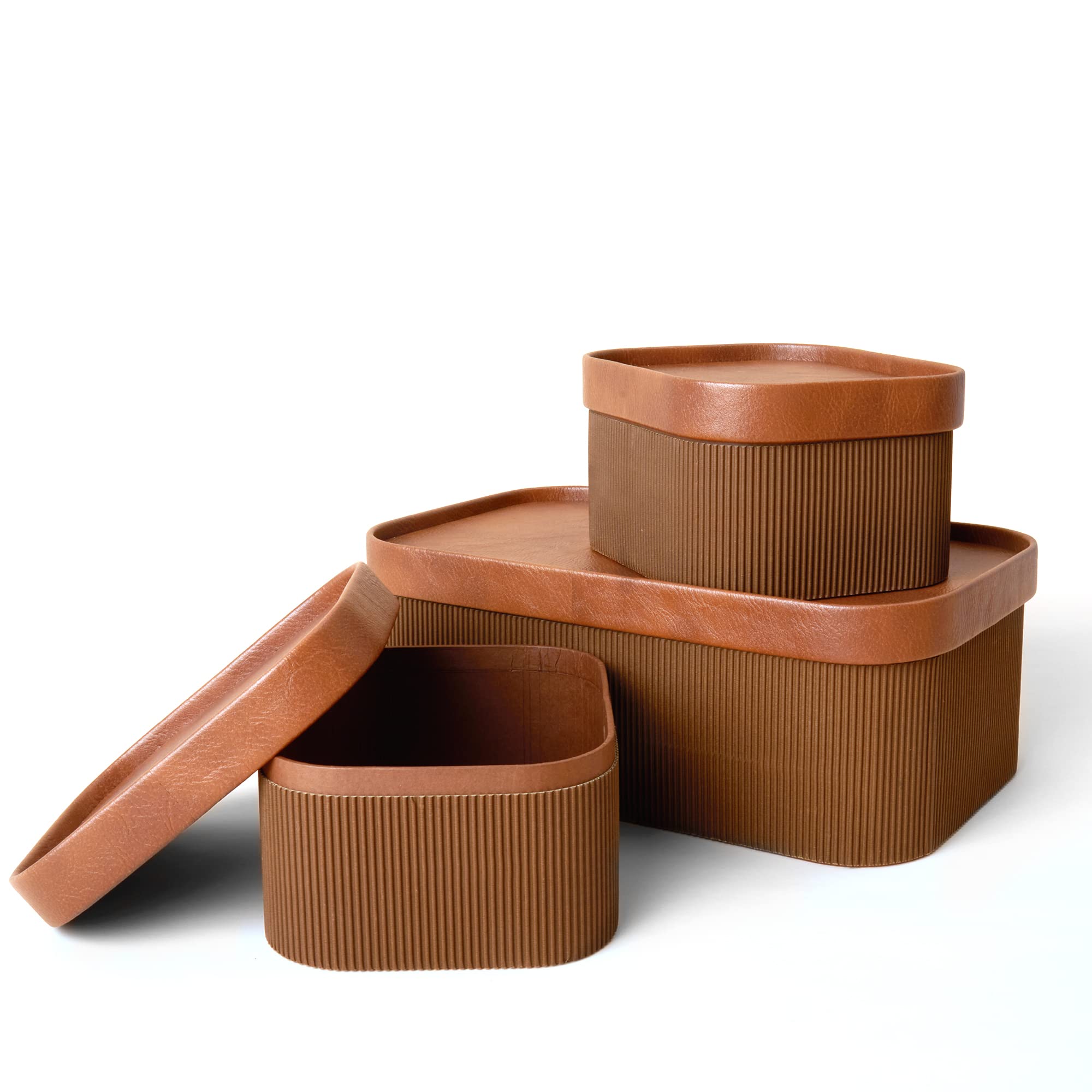 LA JOLIE MUSE front view of three brown lidded boxes, stylish storage solution