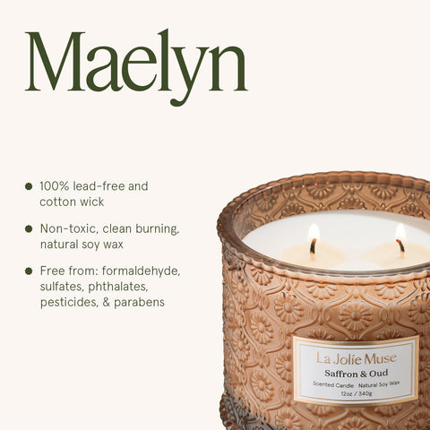 LA JOLIE MUSE candle on table in cozy evening setting creating inviting ambiance benefit