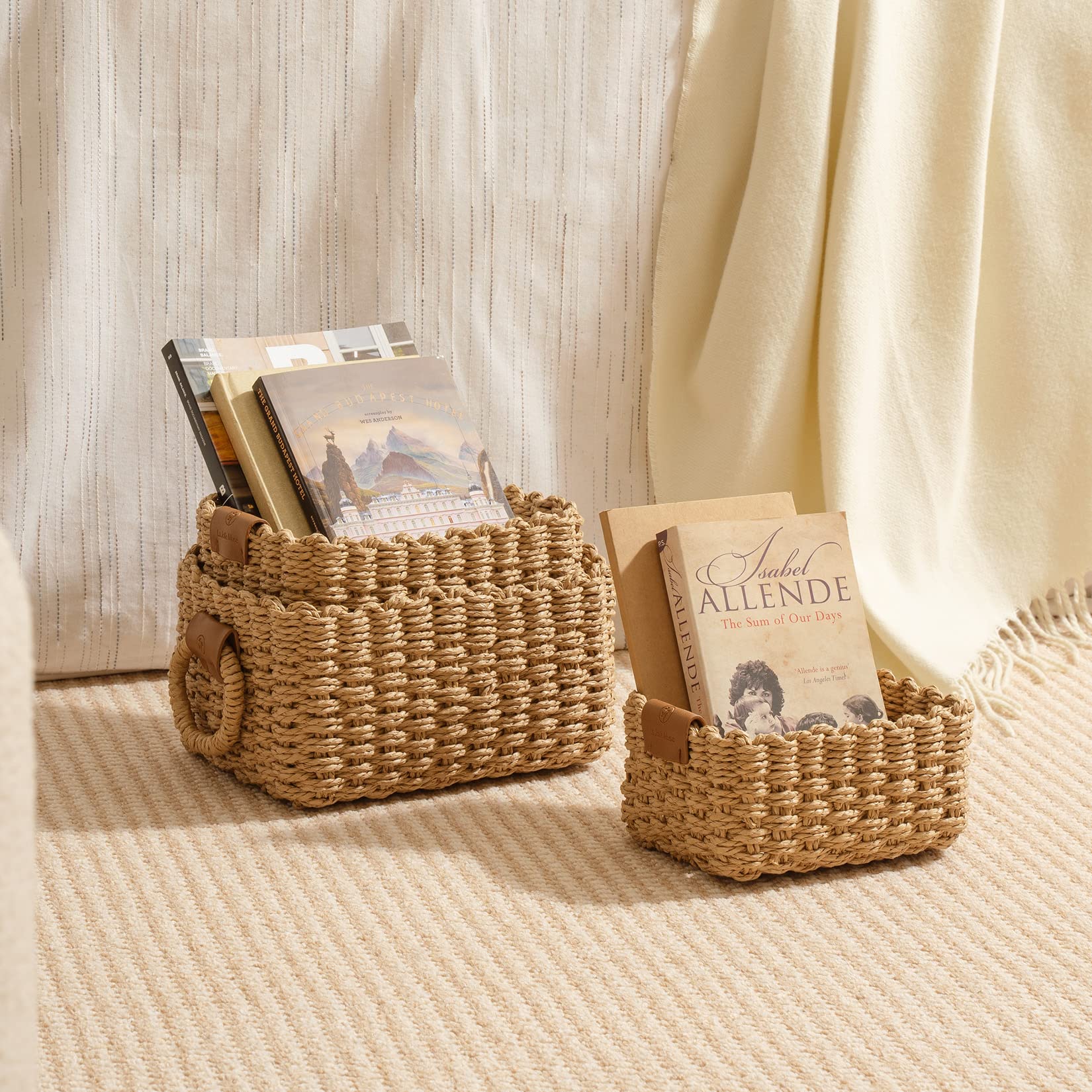 LA JOLIE MUSE baskets styled on a living room shelf showcasing tidy decorative storage
