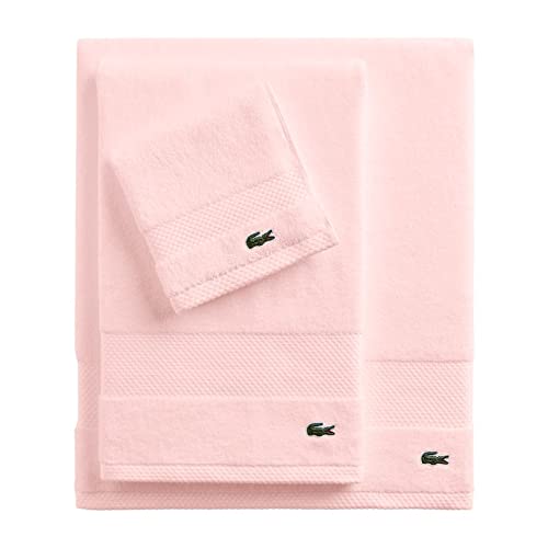 Full 30x54 Lacoste towel draped over rail demonstrating generous coverage and quick drying