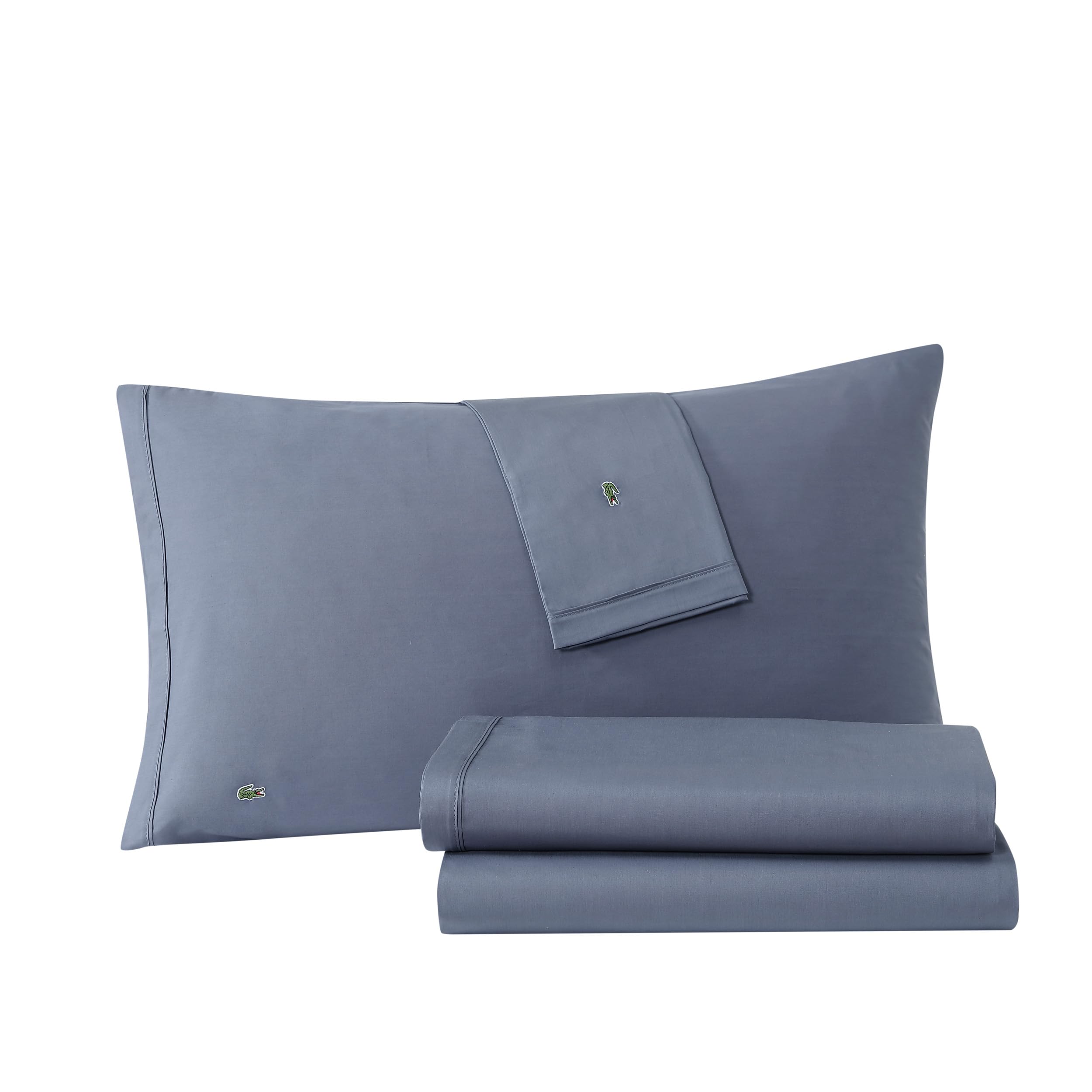 Lacoste pair of pillowcases neatly folded to show coordinated set and comfortable support