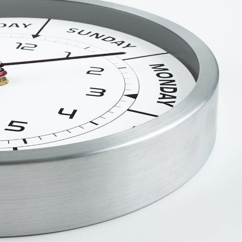 Lafocuse senior checking clock showing independence and daily routine support