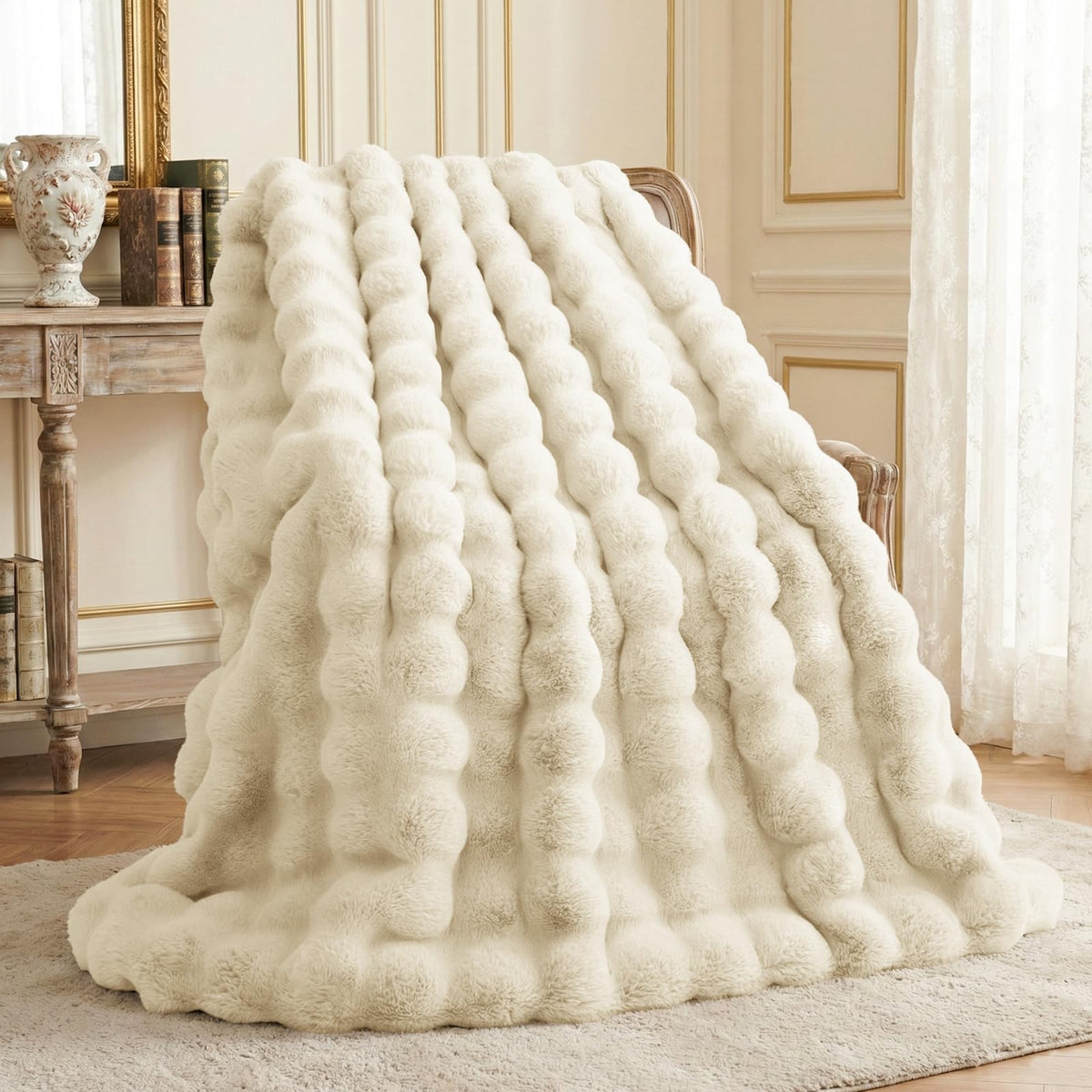 L'AGRATY almond white front view showing plush decorative throw and cozy look